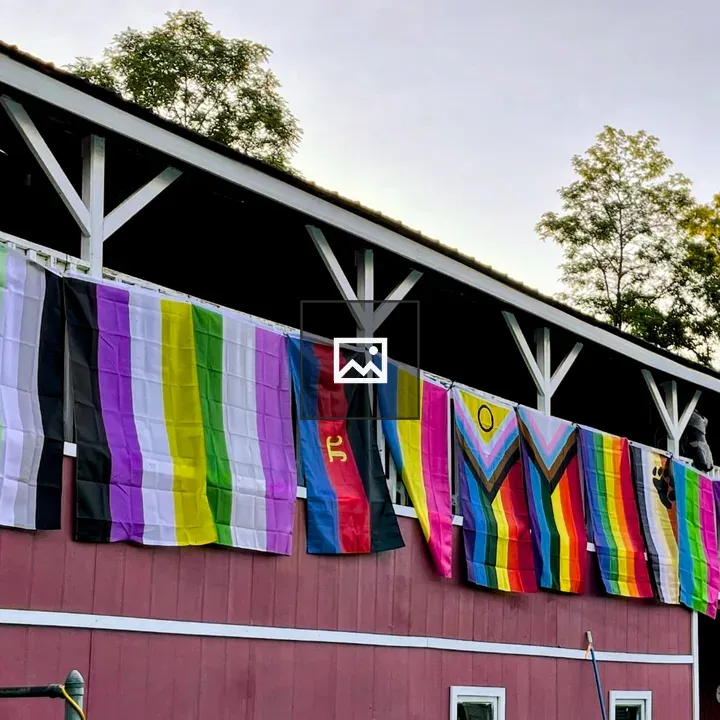 Pride Flags on Red Barn Interior