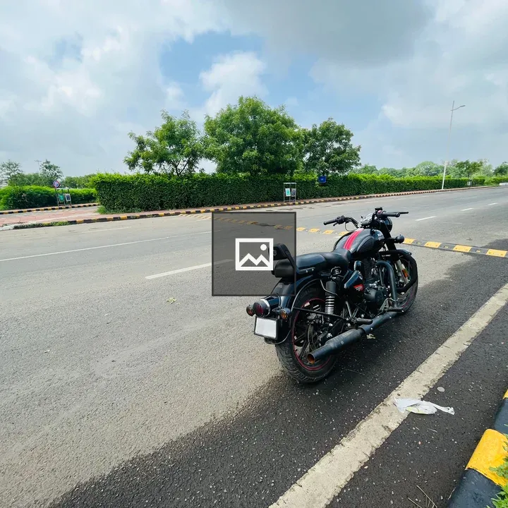 Royal Enfield Motorcycle on Wet Road
