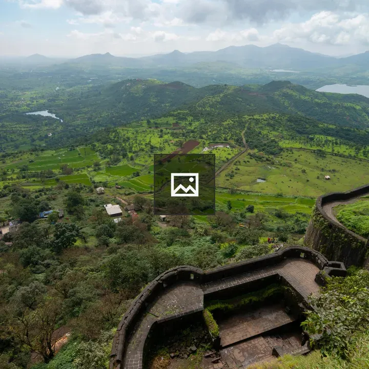 Hilltop View Over Green Valley