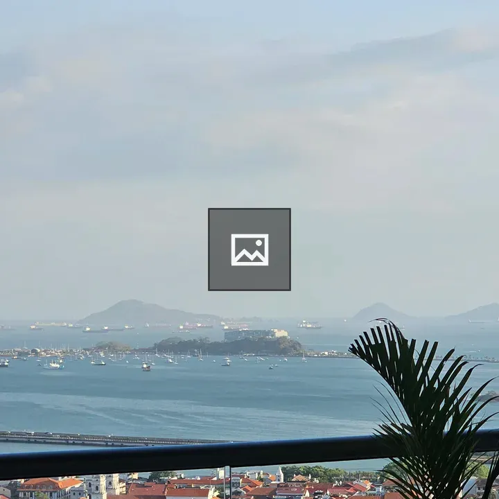 Coastal city panorama with red roofs