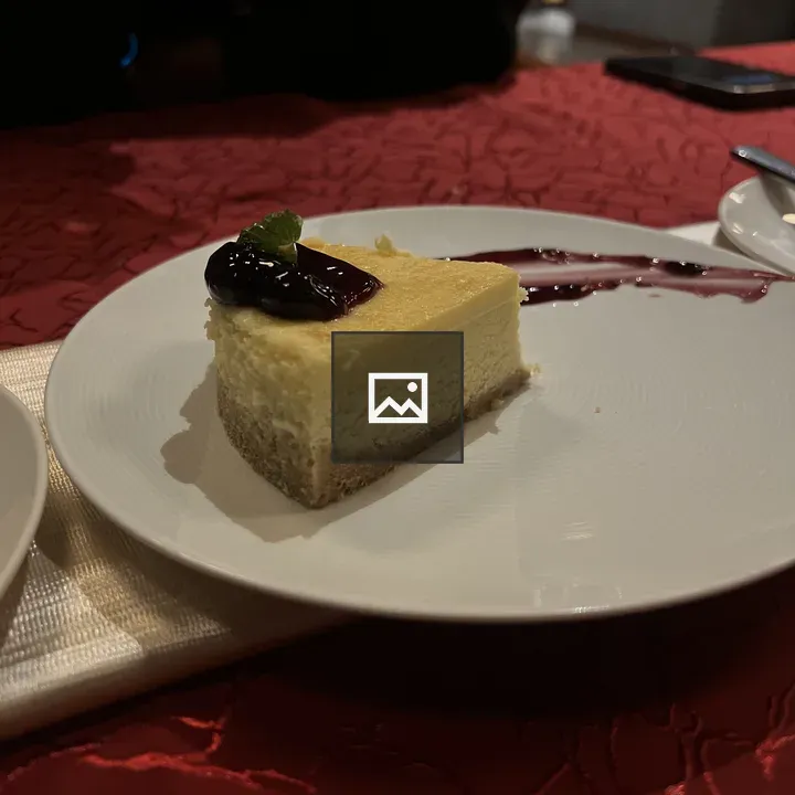 Slice of cheesecake on plate