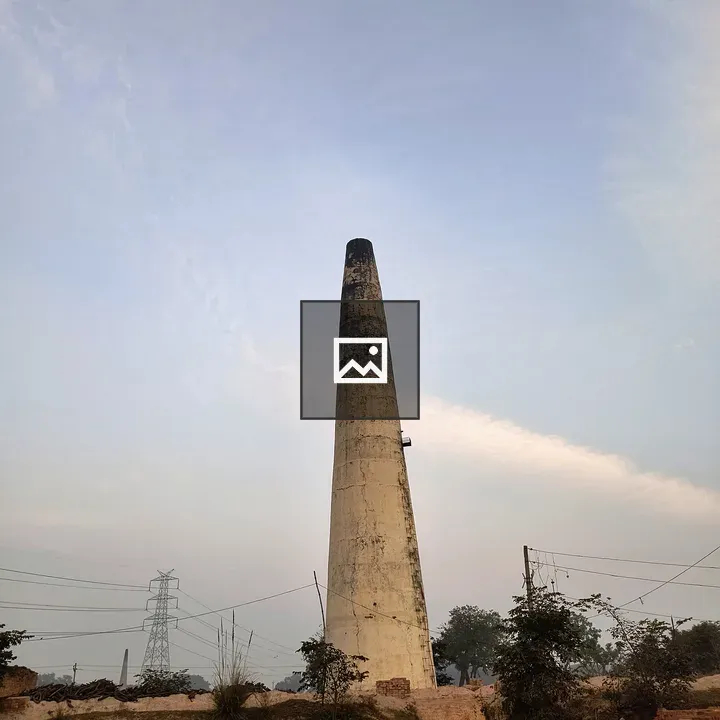Tall chimney in brick kiln