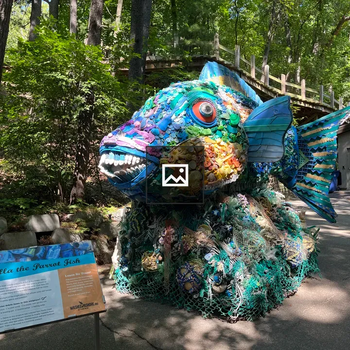 Parrot fish sculpture made of trash