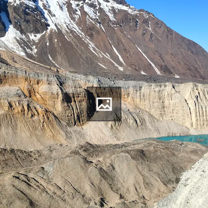 Mountain landscape with snow-dusted peaks