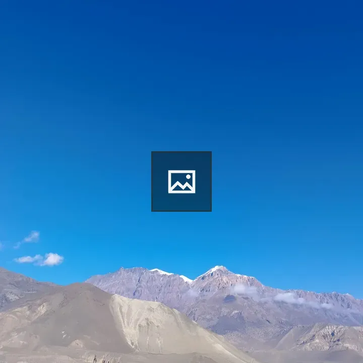 Rugged mountains under blue sky
