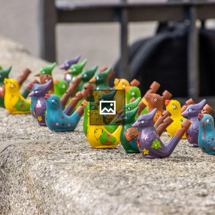 Hand-carved bird whistles