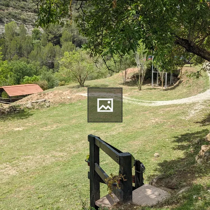 Scenic rural landscape with path and handrail