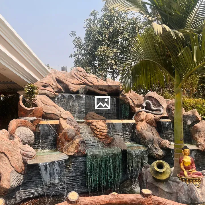 Decorative outdoor waterfall scene