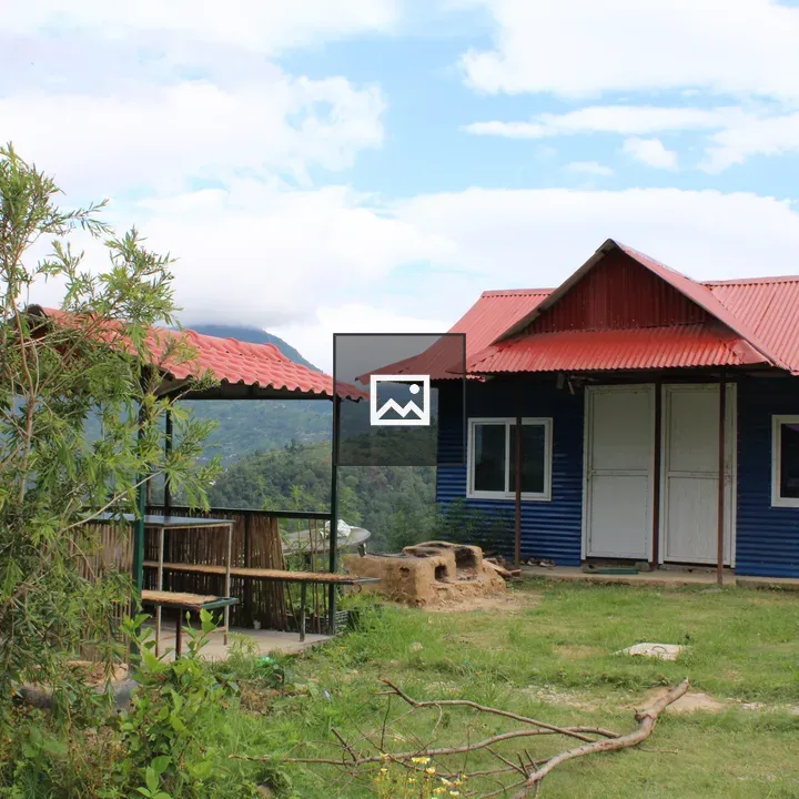Blue cottage and gazebo