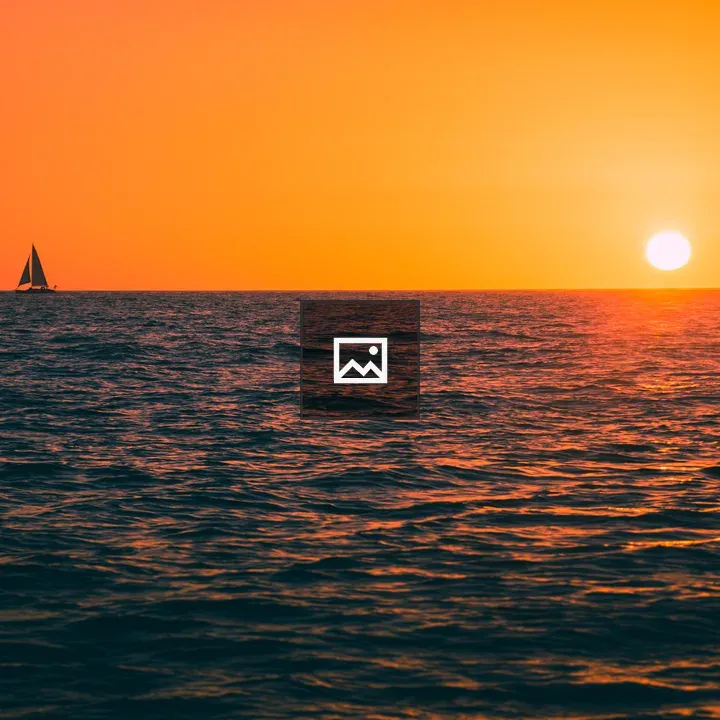 Sailboat on Sunset Water