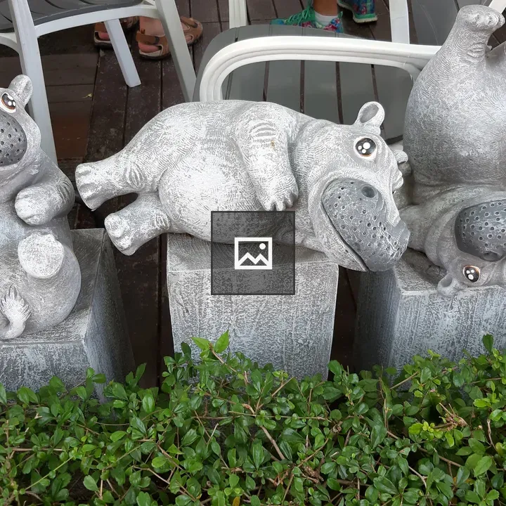 Cement Hippos on Blocks