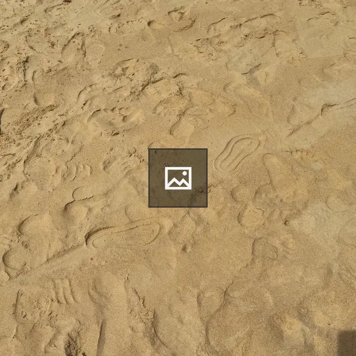 Footprints in beach sand