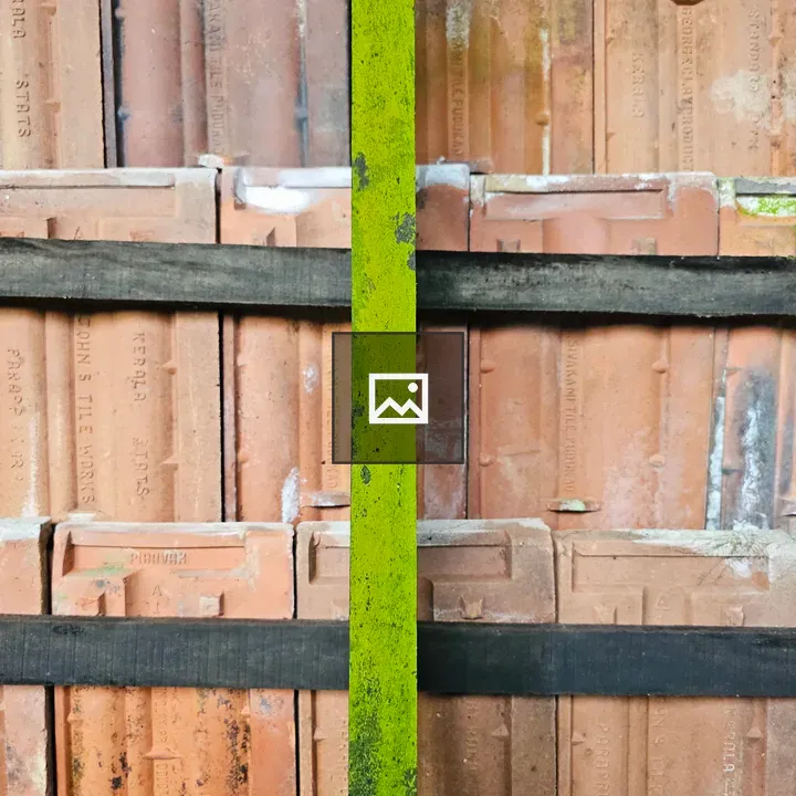 Wooden planks with mossy pole over tiles