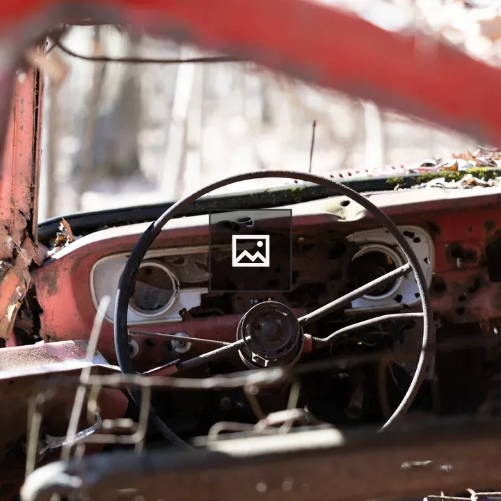 Abandoned vehicle in the woods