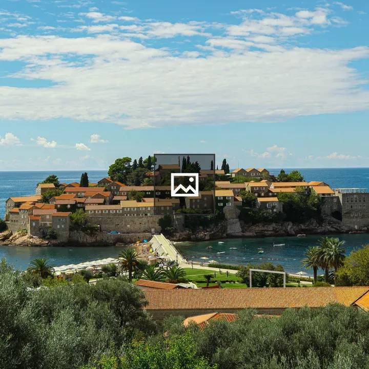 Islet with stone houses and red roofs