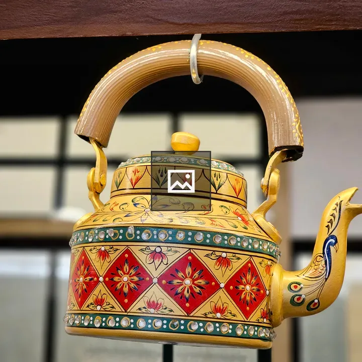 Decorative kettle with colorful patterns