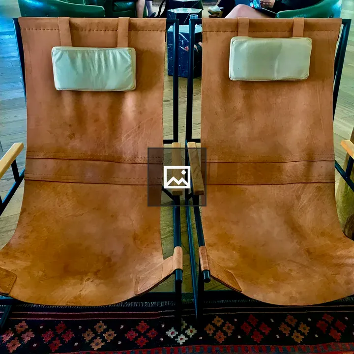 Leather chair with pillow