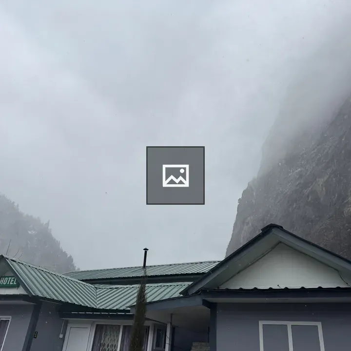 Mountain Mist over Hotel and Peak