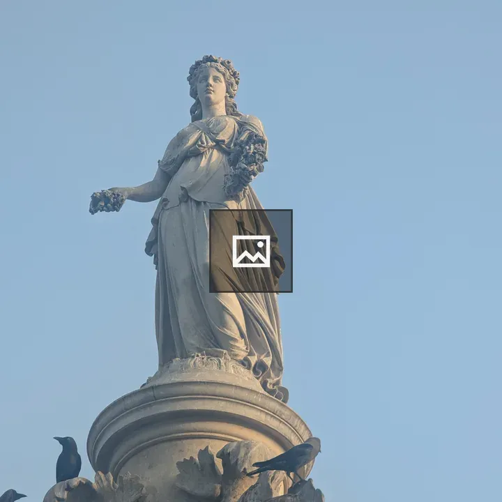 Statue of a Woman with Flowers