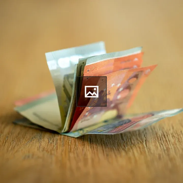 Money Bills on a Surface