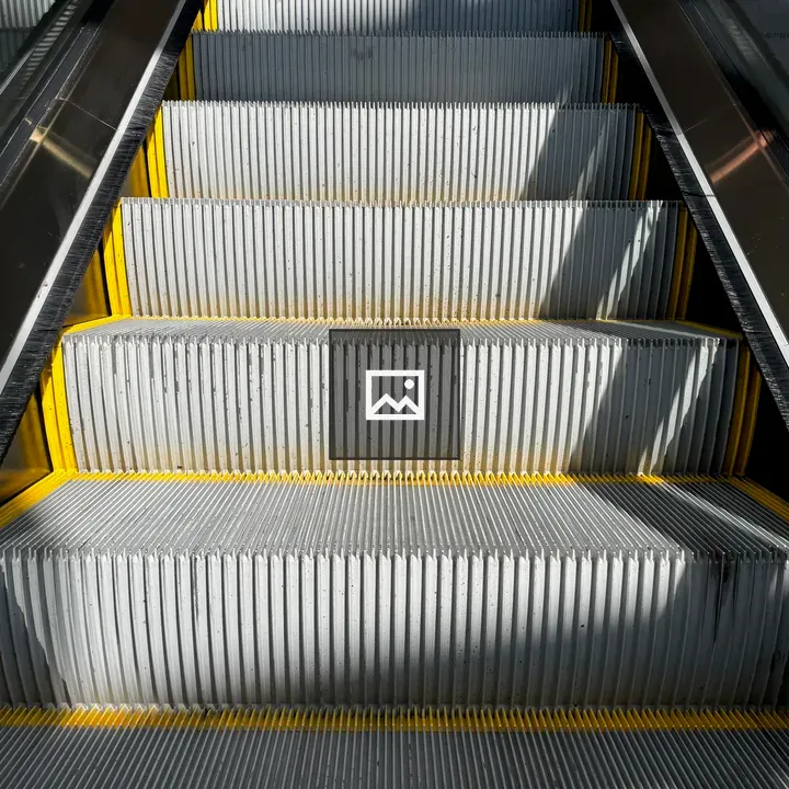 Escalator rising to upper floor