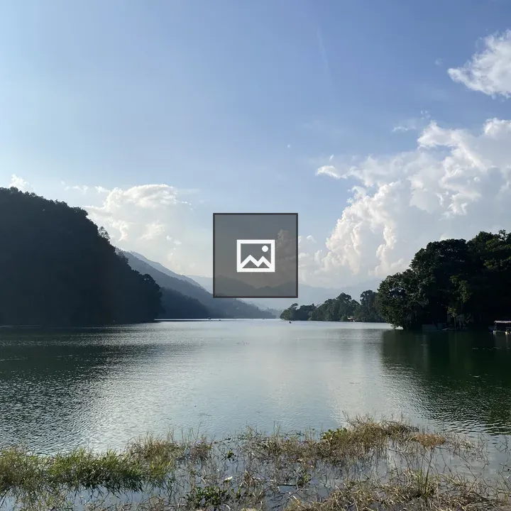 Lake scene with green hills