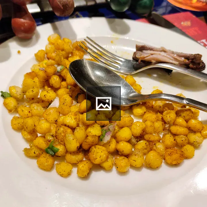 Plate of food with utensils