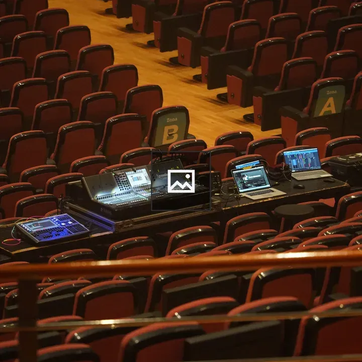 Auditorium with Controls and Chairs