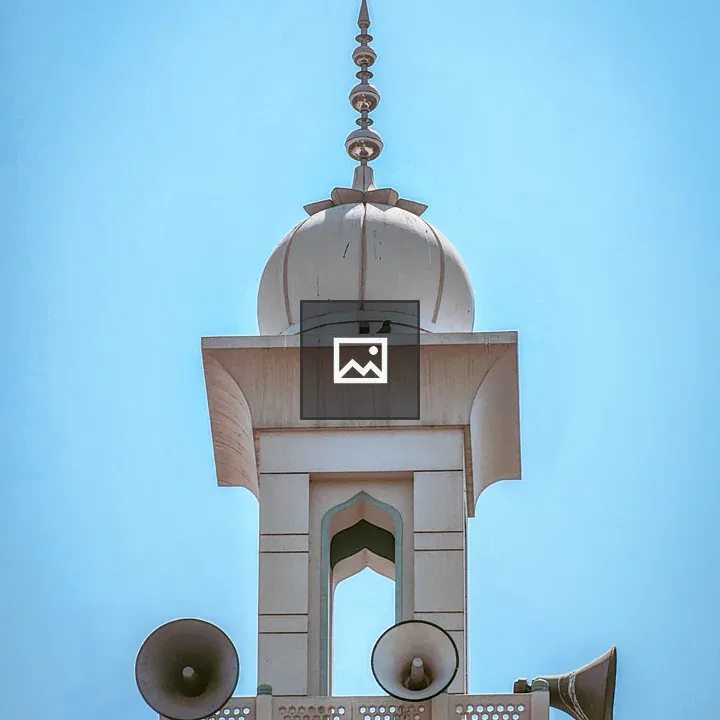 Mosque Minaret with Dome and Speakers