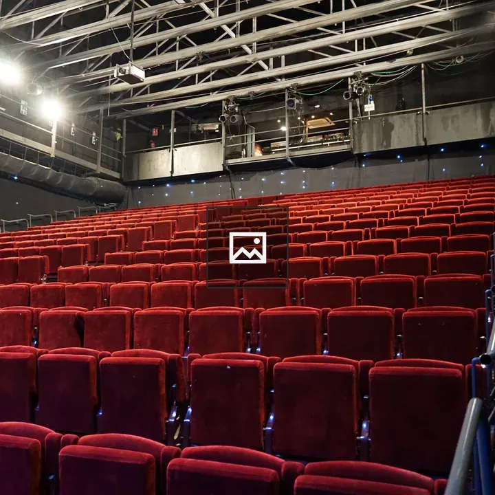 Empty theater with red seats