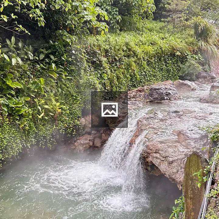 Waterfall over rocky terrain