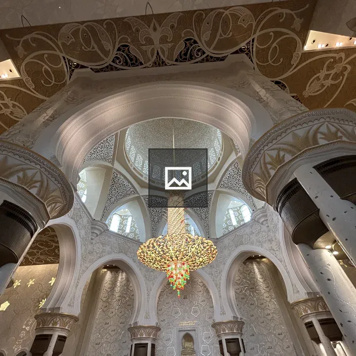 Interior of ornate mosque with columns
