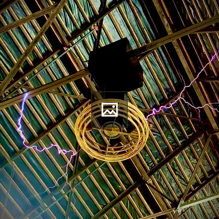 Tesla coil suspended from metal ceiling