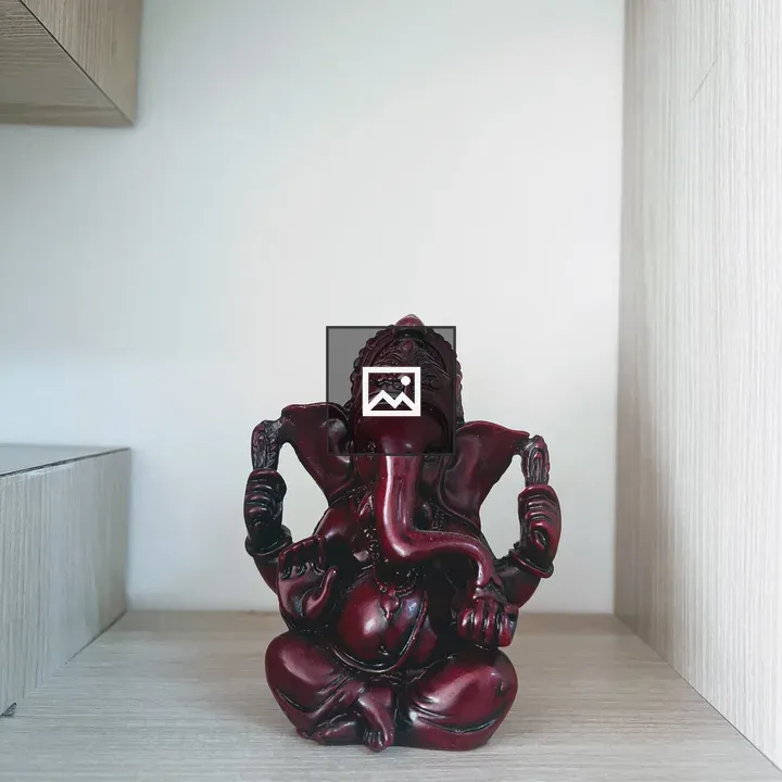 Ganesha sculpture on shelf