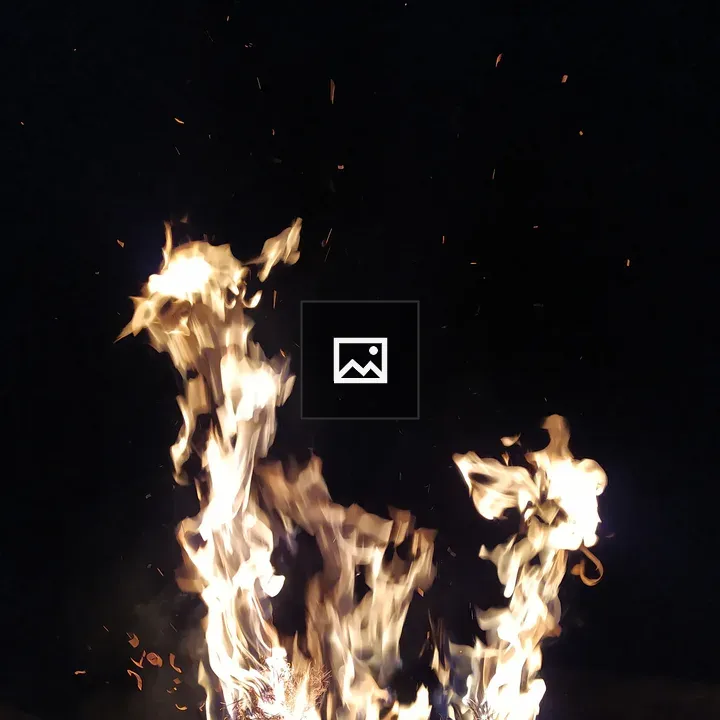 Campfire Sparks at Night