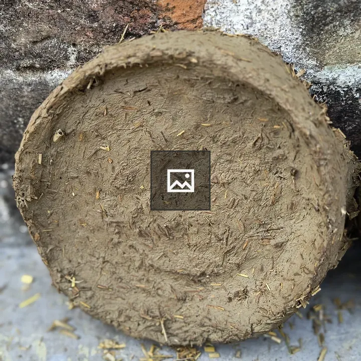 Homemade soil utensil for holding fire