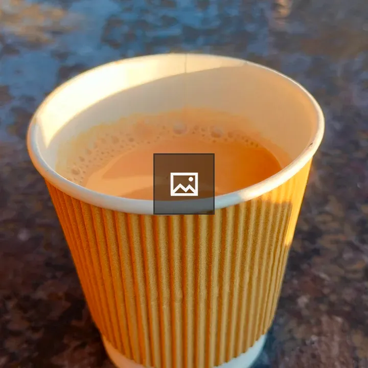 Cup of tea on dark table