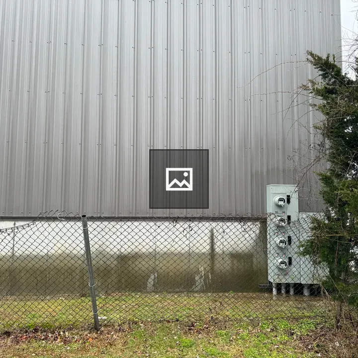 Side of gray industrial building