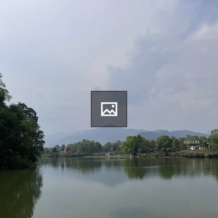 Fewa Lake Scene with Trees and Hills