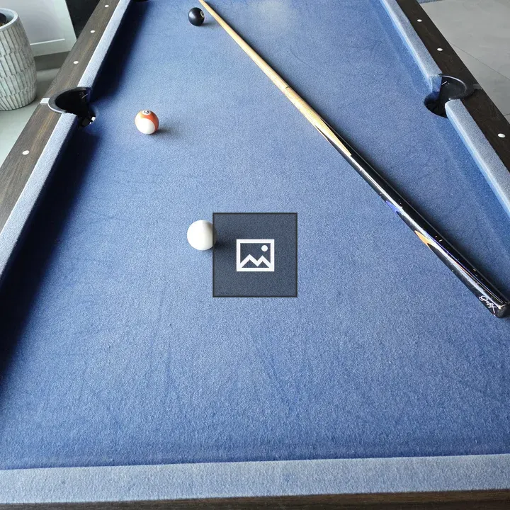 Pool table with blue felt