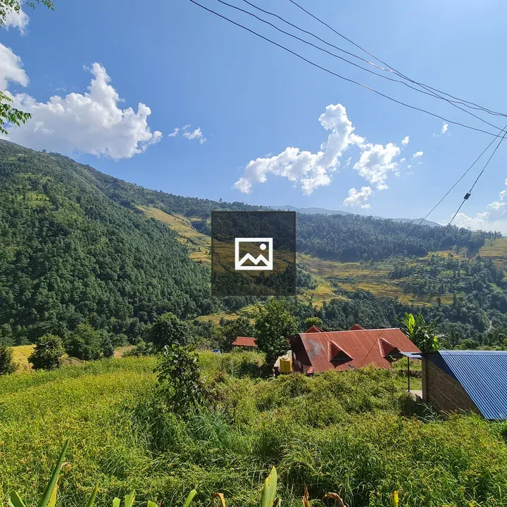 Mountainous terrain with clouds