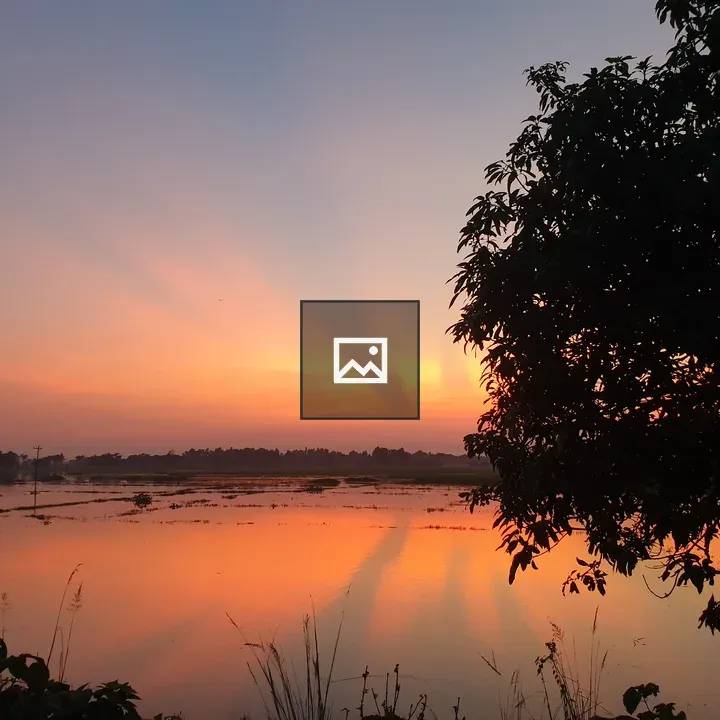 Sunset over flooded field