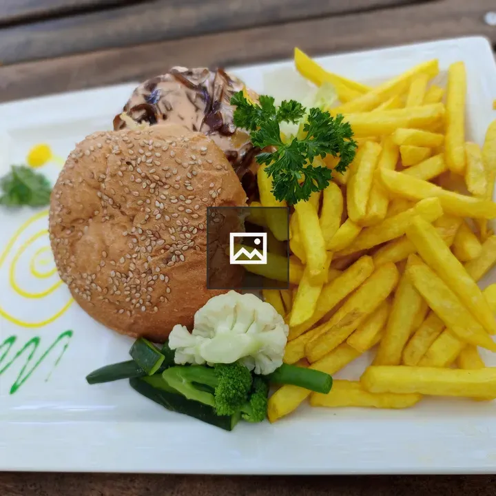 Gourmet Burger with Fries and Vegetables