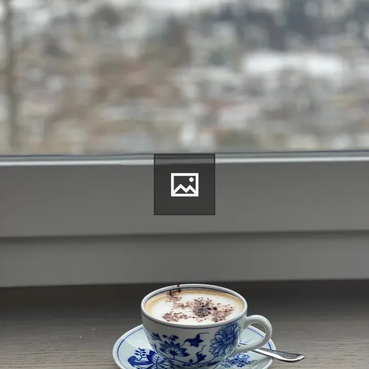 Cup of Coffee on Window Sill