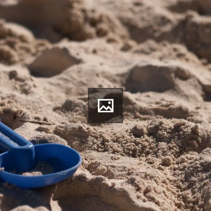 Kids toy shovel on beach