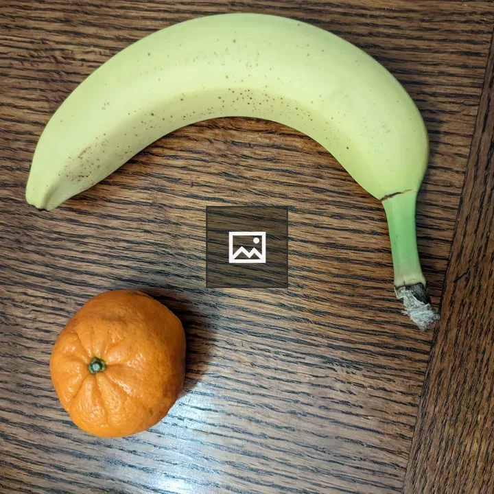 Orange and Banana on Table