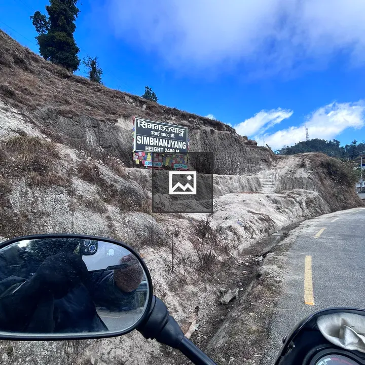 Simbhangyang board and motorcycle reflection