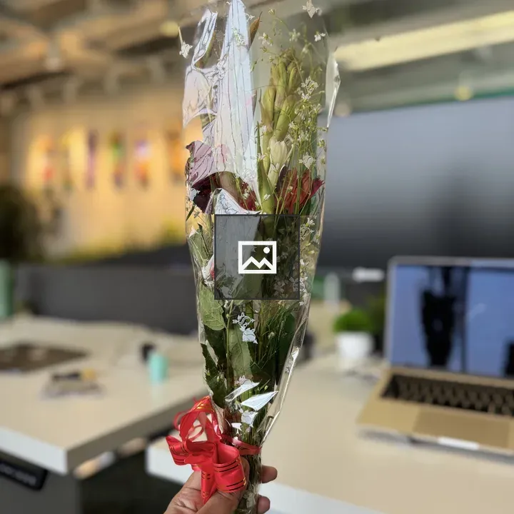Hand Holding Bouquet