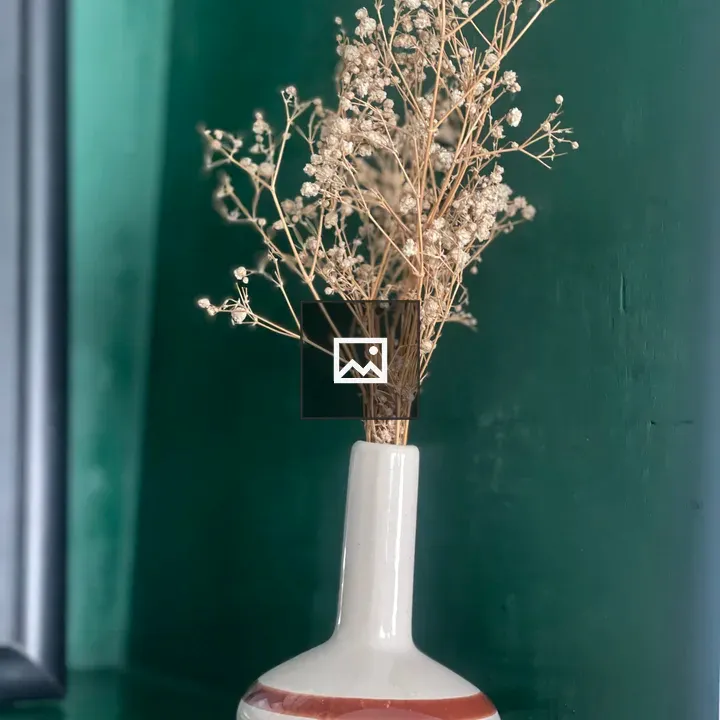 Dried Baby's Breath in Ceramic Vase