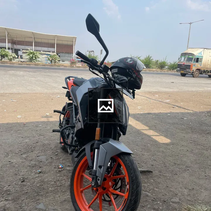 Motorcycle with Orange Wheels